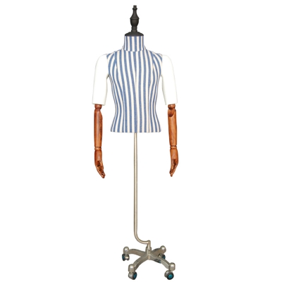 Male mannequin with jointed arms, covered in striped fabric